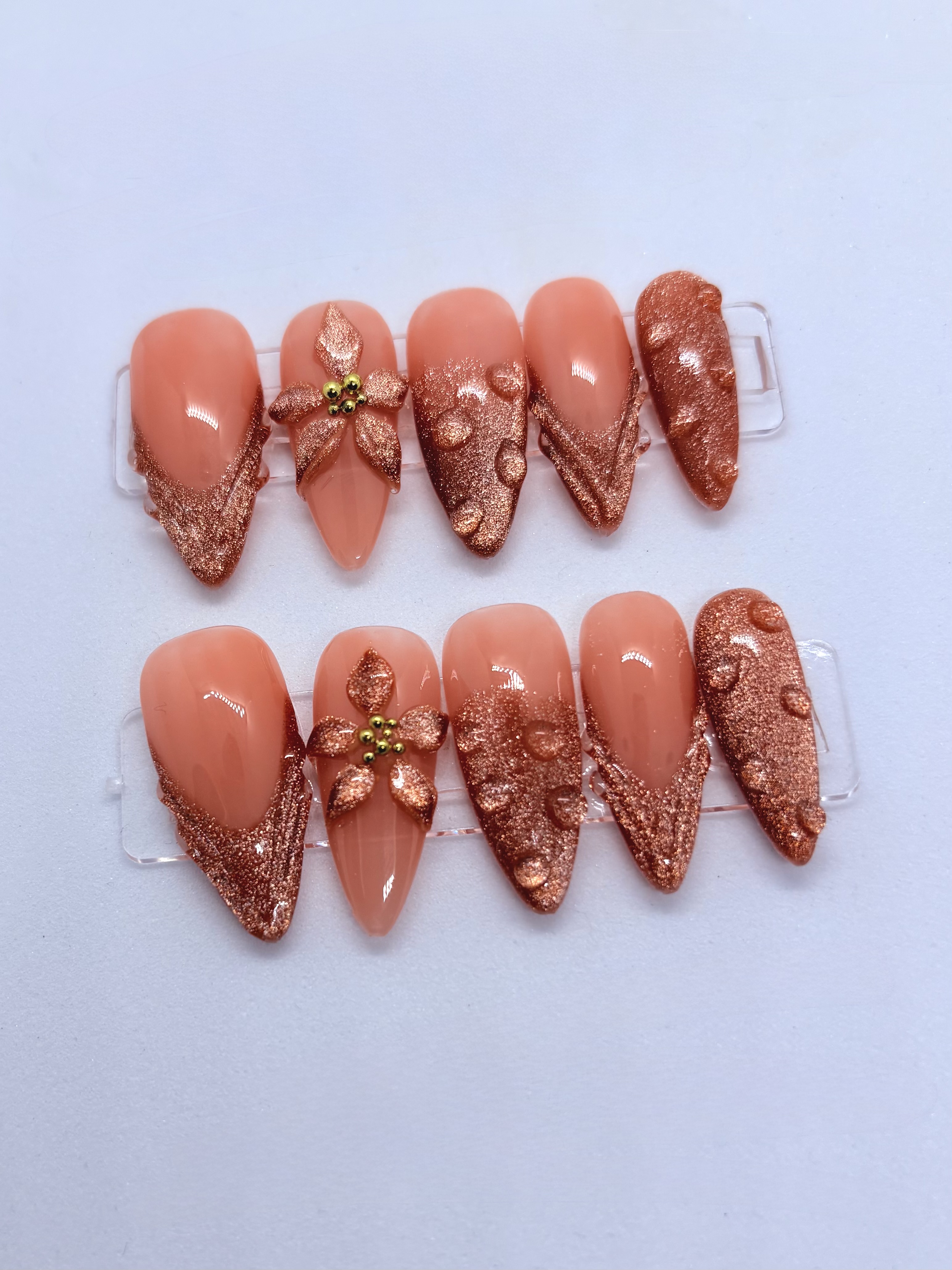 Peach Cat Eye press-on nails close-up
