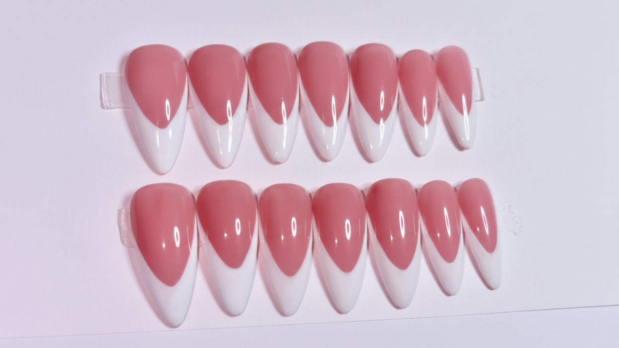 Almond Classic French Tip press-on nails close-up